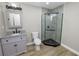 Updated bathroom with a walk-in shower and new fixtures at 748 Mcclellan Rd, Frostproof, FL 33843