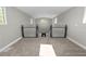 Spacious upper landing overlooking the main entrance at 748 Mcclellan Rd, Frostproof, FL 33843