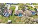 Aerial view showing two homes with pools in a residential neighborhood at 8769 Viking Ln, Lakeland, FL 33809