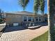 Spacious patio with seating area and lake view at 1015 Crossroads Dr, Polk City, FL 33868