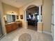 Primary bathroom with soaking tub, shower, and double vanity at 1015 Crossroads Dr, Polk City, FL 33868