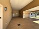 Attached garage with additional covered parking area at 1015 Crossroads Dr, Polk City, FL 33868