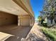 Covered parking and attached garage with brick pavers at 1015 Crossroads Dr, Polk City, FL 33868