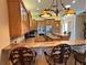 Kitchen boasts granite countertops, stainless steel appliances and breakfast bar at 1015 Crossroads Dr, Polk City, FL 33868