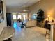 Bright living room with vaulted ceilings and open floor plan at 1015 Crossroads Dr, Polk City, FL 33868