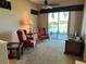 Relaxing sitting room with lake view and comfortable seating at 1015 Crossroads Dr, Polk City, FL 33868