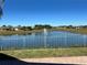 Lakefront property with fountain and neighborhood view at 1015 Crossroads Dr, Polk City, FL 33868