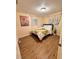 Comfortable bedroom with a queen bed and large window at 107 W 7Th St, Frostproof, FL 33843