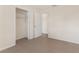 Bedroom with tile floors and a large closet at 107 W 7Th St, Frostproof, FL 33843