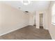 Spacious bedroom with wood-look floors and a closet at 107 W 7Th St, Frostproof, FL 33843