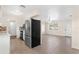 Modern kitchen with stainless steel appliances and white cabinetry at 107 W 7Th St, Frostproof, FL 33843