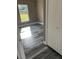 Bright bedroom featuring grey wood-look flooring at 1108 Crestview Ave, Lakeland, FL 33805