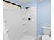 Updated bathroom with white shower and toilet at 2206 Golden Horseshoe N Cir, Lakeland, FL 33810
