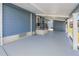 Covered patio with concrete flooring, providing extra outdoor space at 2206 Golden Horseshoe N Cir, Lakeland, FL 33810