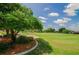 Landscaped view of a lush green golf course at 2206 Golden Horseshoe N Cir, Lakeland, FL 33810