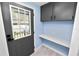 Practical laundry room with countertop and storage at 2206 Golden Horseshoe N Cir, Lakeland, FL 33810
