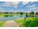 Enjoy a relaxing view of this community pond at 2206 Golden Horseshoe N Cir, Lakeland, FL 33810
