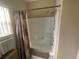 Clean bathroom featuring shower and tub combo with curtain at 2356 Peavine Cir # 1017, Lakeland, FL 33810
