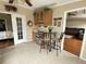 Cozy kitchen bar area featuring a small sink and cooler with an adjacent seating area at 2356 Peavine Cir # 1017, Lakeland, FL 33810