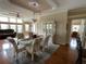 Open living room featuring hardwood floors, lots of natural light, and comfortable furnishings at 2356 Peavine Cir # 1017, Lakeland, FL 33810