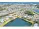 Aerial view of home near lake in residential neighborhood at 3710 Madbury Cir, Lakeland, FL 33810