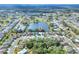 Aerial view of home near lake in residential neighborhood at 3710 Madbury Cir, Lakeland, FL 33810