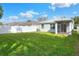 Spacious backyard with large grassy area at 3710 Madbury Cir, Lakeland, FL 33810