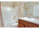 Clean bathroom with tub shower, vanity, and updated fixtures at 3710 Madbury Cir, Lakeland, FL 33810