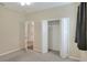 Bedroom with closet and access to hallway at 3710 Madbury Cir, Lakeland, FL 33810