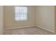 Bright bedroom with neutral walls and carpeted floors at 3710 Madbury Cir, Lakeland, FL 33810