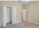 Spacious bedroom closet with built-in shelving at 3710 Madbury Cir, Lakeland, FL 33810