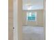 Bedroom with closet and view into another room at 3710 Madbury Cir, Lakeland, FL 33810