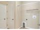 Bright laundry room with built-in shelving and storage at 3710 Madbury Cir, Lakeland, FL 33810