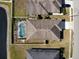Aerial view looking straight down on a screened in pool behind a home at 4018 Sundance Place Loop, Mulberry, FL 33860