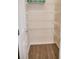 Walk-in pantry with shelving and hardwood floors at 4018 Sundance Place Loop, Mulberry, FL 33860