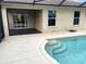 Pool with steps leading into the water and an outdoor patio at 4018 Sundance Place Loop, Mulberry, FL 33860