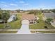 Single-story house with a two-car garage and a well-maintained lawn at 4032 Derby Dr, Lakeland, FL 33809