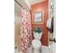 Small bathroom with shower and terracotta walls at 4032 Derby Dr, Lakeland, FL 33809