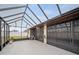 Relaxing screened lanai offers ample space and natural light at 4032 Derby Dr, Lakeland, FL 33809
