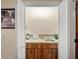 Wet bar with wood cabinets and a small sink at 4032 Derby Dr, Lakeland, FL 33809