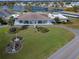 Aerial view of community clubhouse and grounds at 5079 Lodgewood Dr, Lakeland, FL 33810