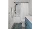 Updated bathroom with subway tile, new bathtub, and vanity at 5079 Lodgewood Dr, Lakeland, FL 33810