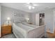Serene bedroom featuring a sleigh bed and neutral decor at 5079 Lodgewood Dr, Lakeland, FL 33810