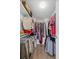 Walk-in closet with ample shelving and hanging space at 5079 Lodgewood Dr, Lakeland, FL 33810