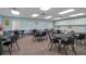 Community room featuring tables and chairs in a welcoming setting at 5079 Lodgewood Dr, Lakeland, FL 33810