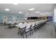 Large dining room with numerous tables and chairs at 5079 Lodgewood Dr, Lakeland, FL 33810