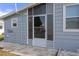 Exterior view showing patio and screened enclosure at 5079 Lodgewood Dr, Lakeland, FL 33810