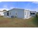 Rear exterior view of the house at 5079 Lodgewood Dr, Lakeland, FL 33810