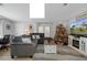 Comfortable living room with a sectional sofa, coffee table, and large TV at 5079 Lodgewood Dr, Lakeland, FL 33810