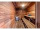 Clean sauna with wooden benches and shower at 5079 Lodgewood Dr, Lakeland, FL 33810